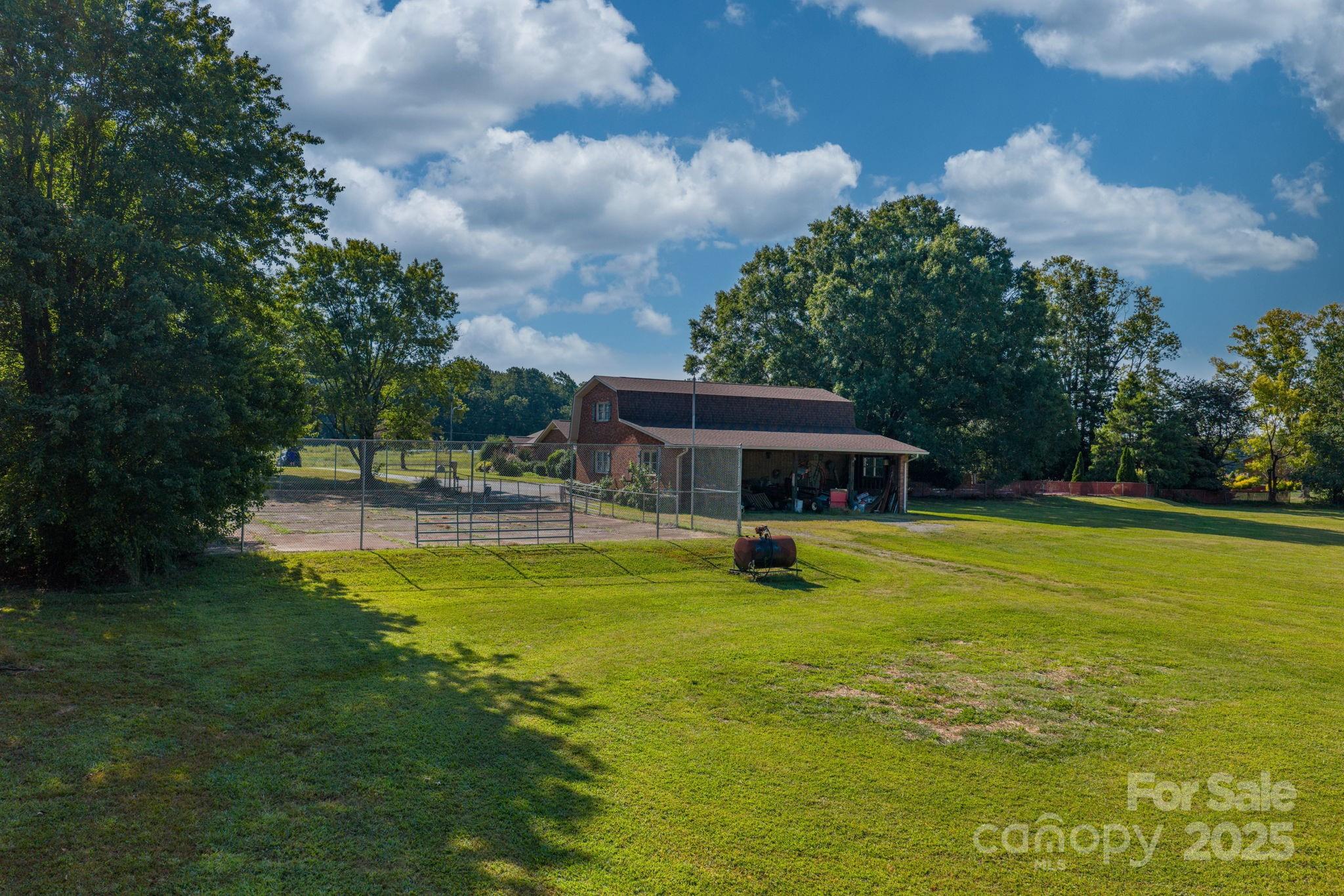 2551 Buffalo Shoals Road Newton, NC 28658 - Photo 44 of 47 a view of a swimming pool with a patio