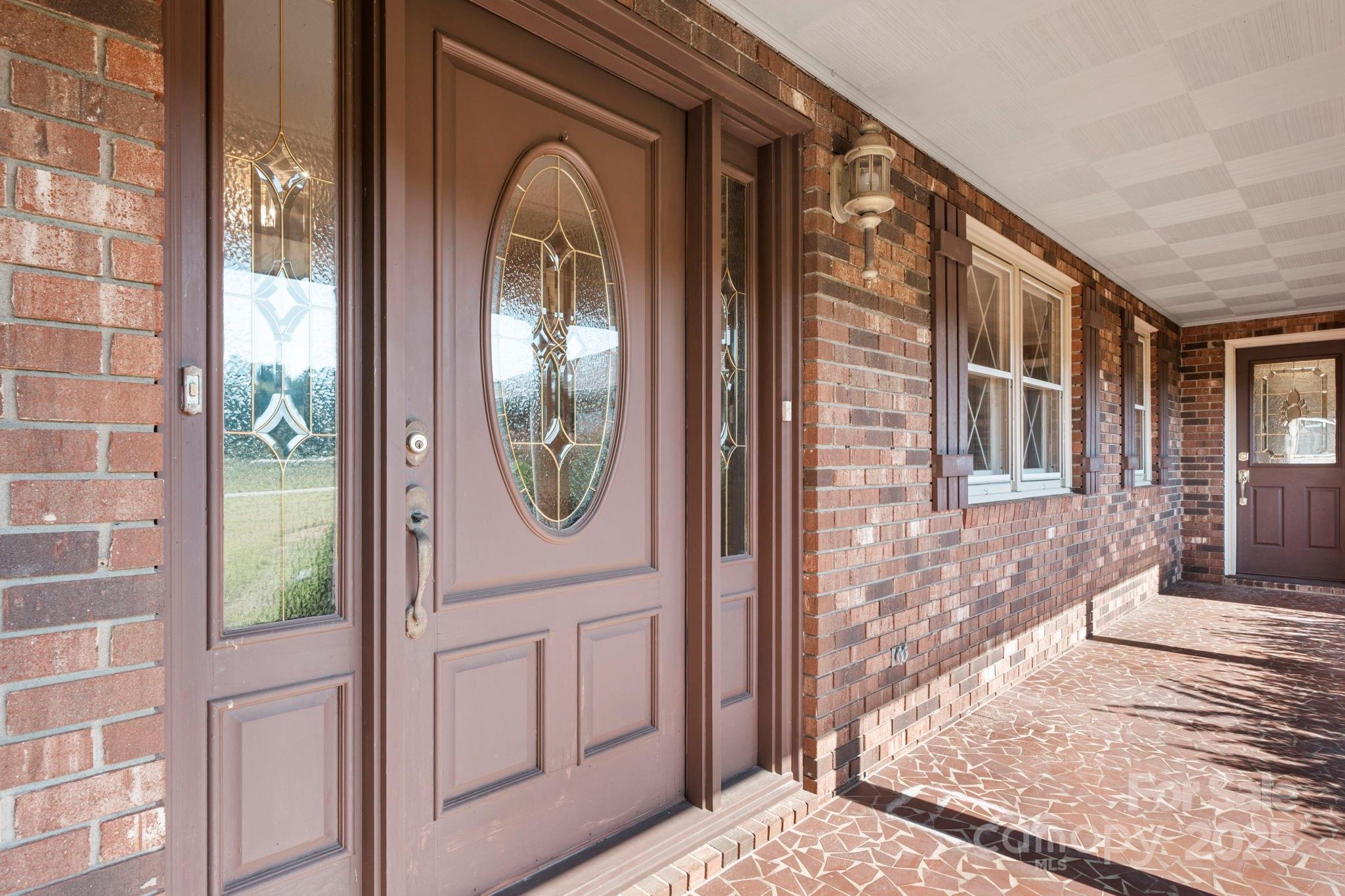 2551 Buffalo Shoals Road Newton, NC 28658 - Photo 6 of 47 a view of a entryway door front of a house