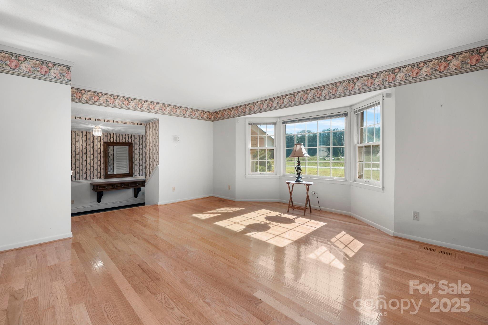 2551 Buffalo Shoals Road Newton, NC 28658 - Photo 8 of 47 a bedroom with a large bed and a window