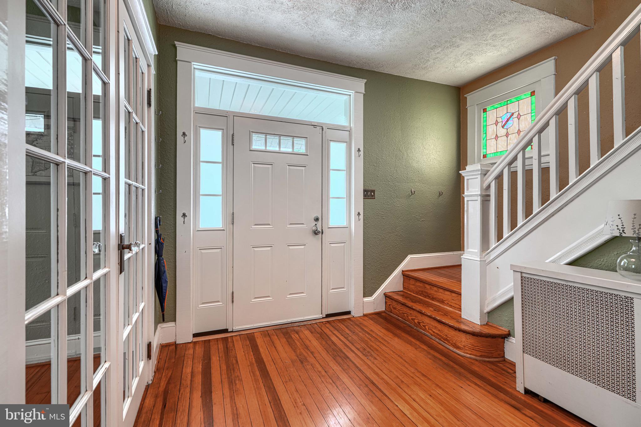 2705 Latona Road Baltimore, MD 21214 - Photo 7 of 53 a view of an entryway with staircase