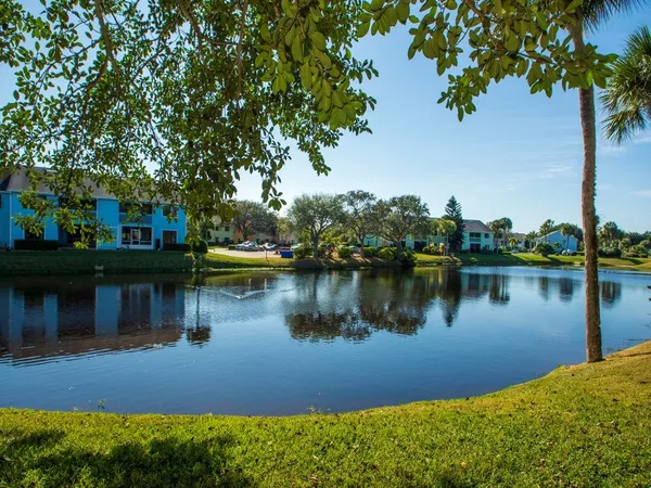 a view of a lake with houses