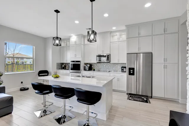 $699,000 | 4620 Ambersweet Way, The Acreage, FL 33470