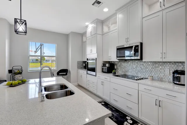 $699,000 | 4620 Ambersweet Way, The Acreage, FL 33470