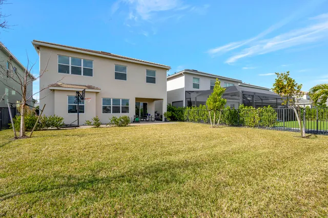 $699,000 | 4620 Ambersweet Way, The Acreage, FL 33470