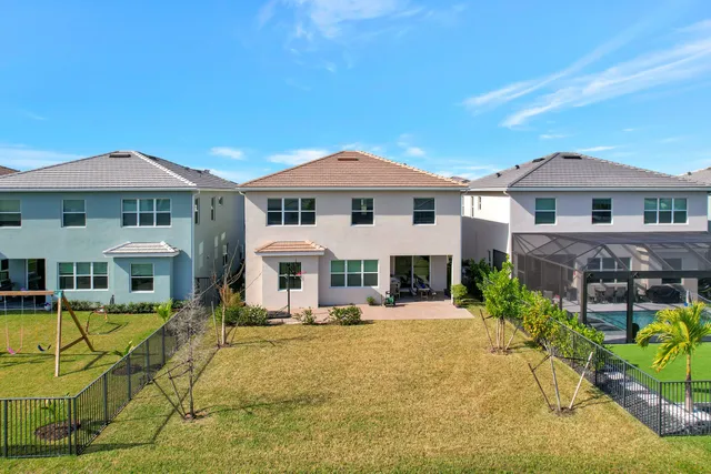 $699,000 | 4620 Ambersweet Way, The Acreage, FL 33470