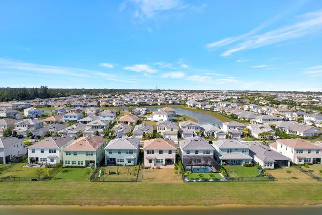 $699,000 | 4620 Ambersweet Way, The Acreage, FL 33470