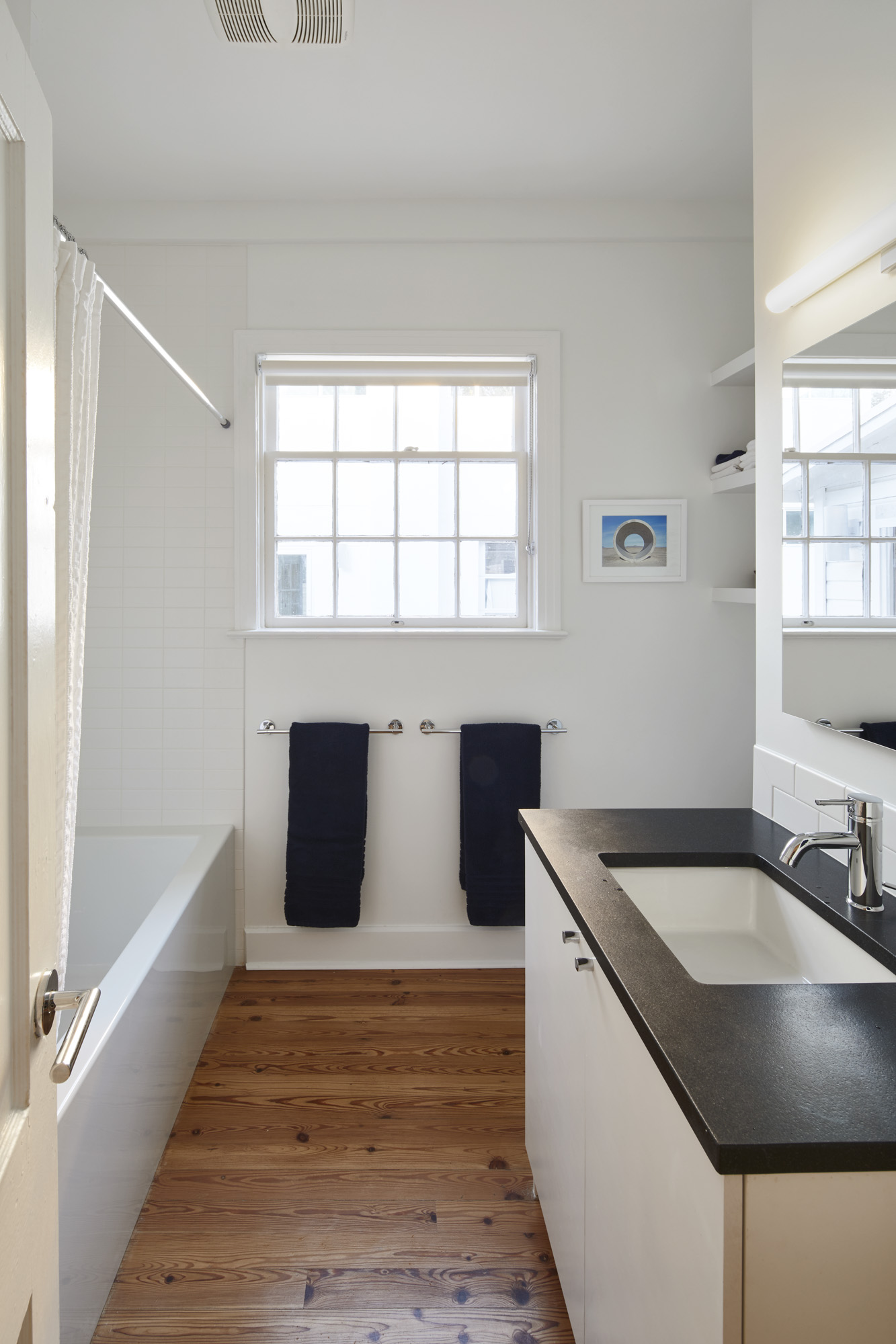 902 West Mary Street, Unit 1 Austin, TX 78704 - Photo 9 of 16 Full bathroom with vanity, dark wood finished floors, and shower / bathtub combination with curtain