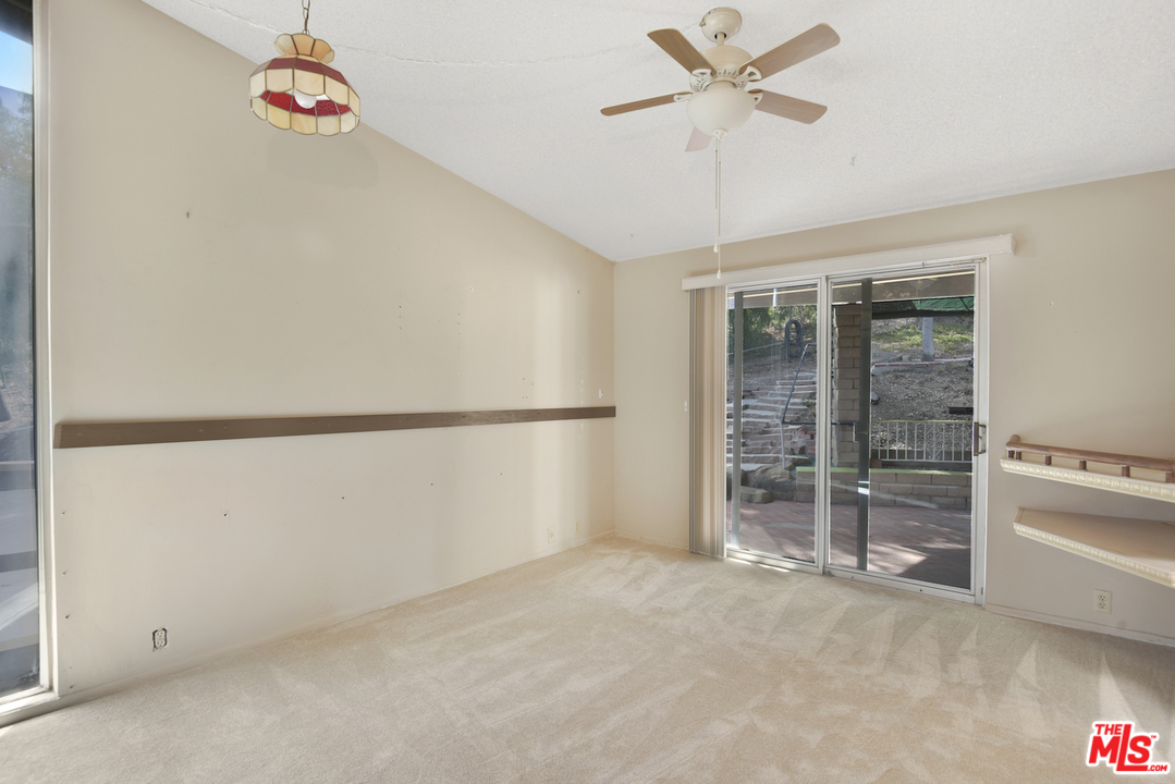 145 Old Church Road Topanga, CA 90290 - Photo 13 of 37 wooden floor in an empty room with a window