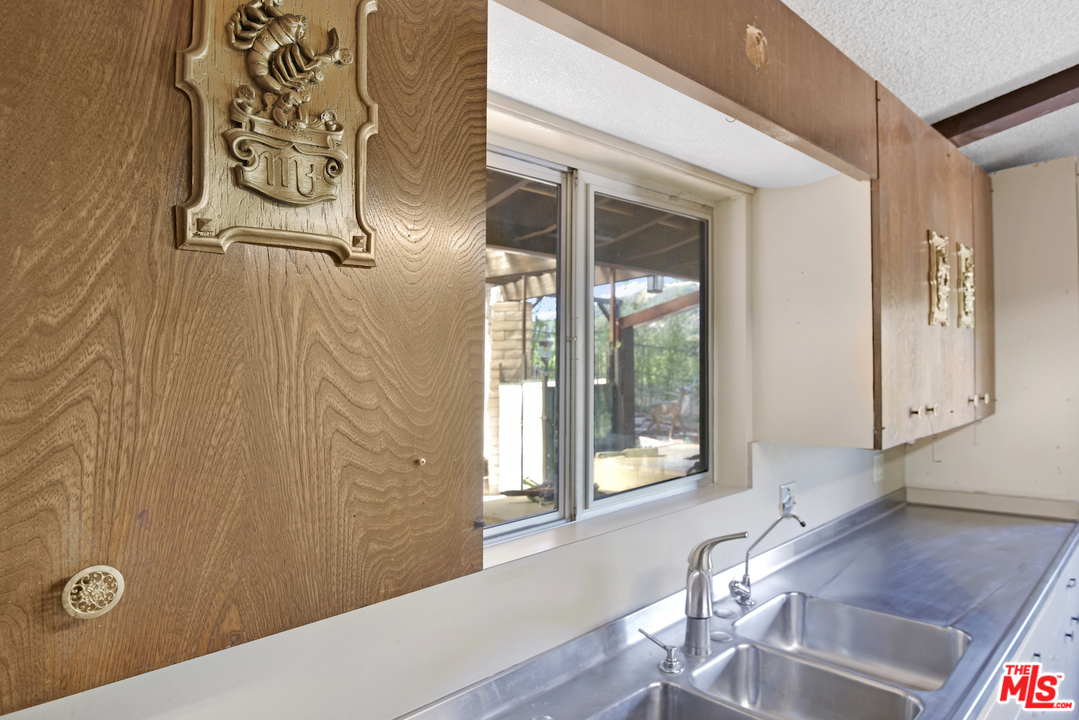 145 Old Church Road Topanga, CA 90290 - Photo 15 of 37 a view of a hallway with windows