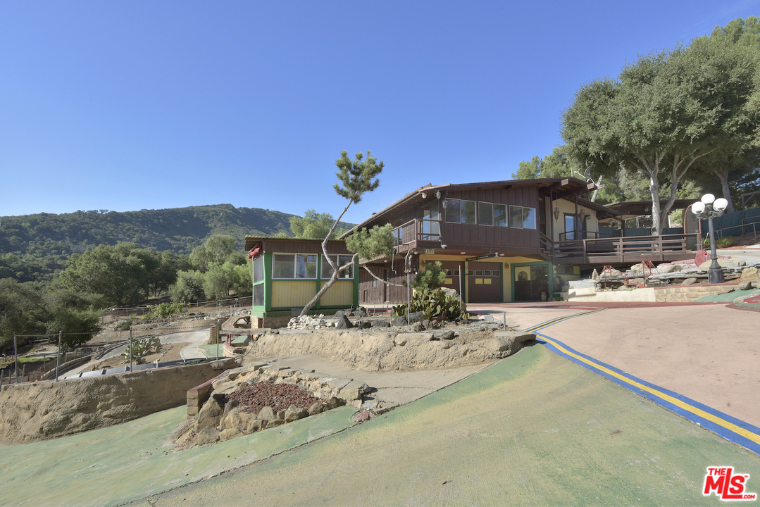 145 Old Church Road Topanga, CA 90290 - Photo 18 of 37 a view of a house with a snow on the road