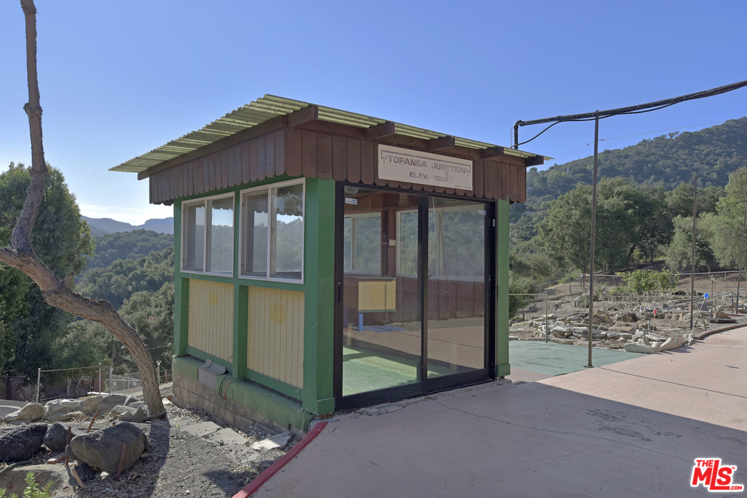 145 Old Church Road Topanga, CA 90290 - Photo 20 of 37 a front view of a house with garden