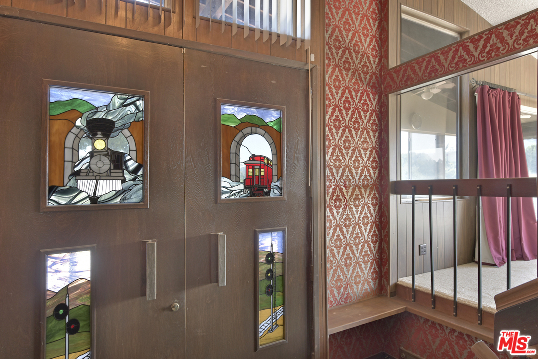 145 Old Church Road Topanga, CA 90290 - Photo 24 of 37 a view of a entryway door of the house