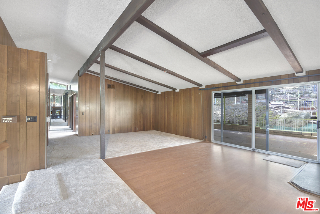 145 Old Church Road Topanga, CA 90290 - Photo 27 of 37 a view of empty room with wooden floor