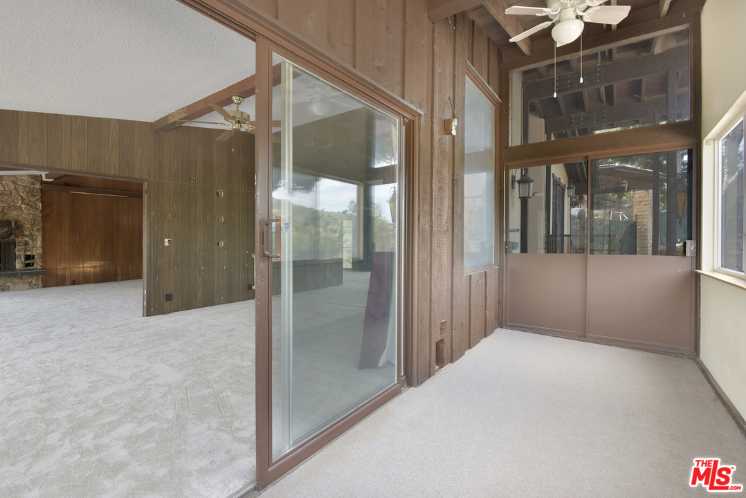 145 Old Church Road Topanga, CA 90290 - Photo 28 of 37 a view of a glass door of the house