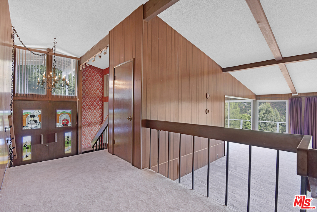 145 Old Church Road Topanga, CA 90290 - Photo 30 of 37 a view of a hallway with windows