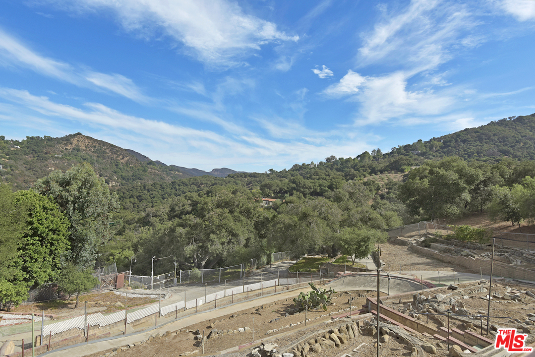 145 Old Church Road Topanga, CA 90290 - Photo 4 of 37 a view of a road with a yard