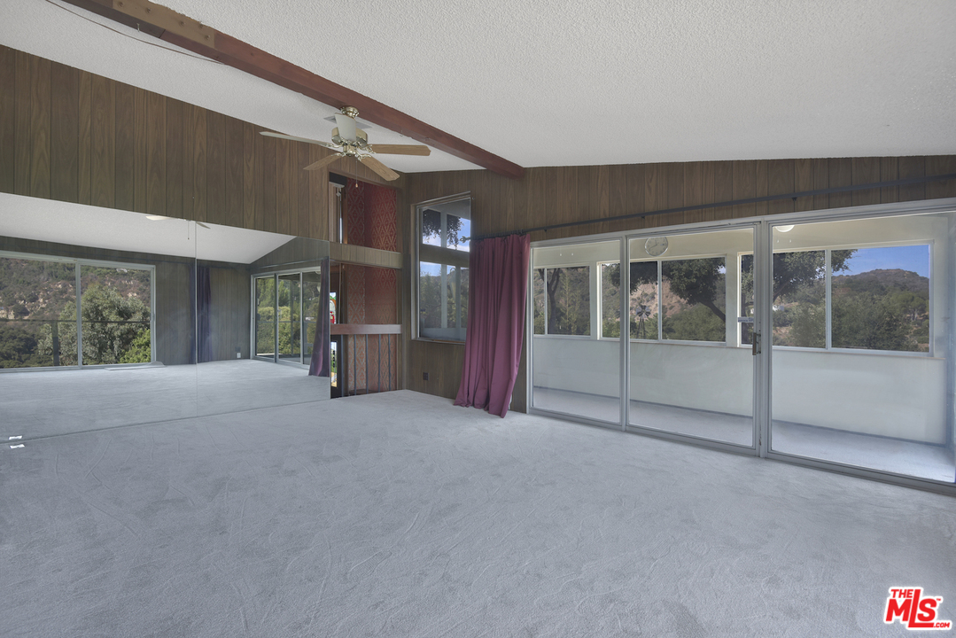 145 Old Church Road Topanga, CA 90290 - Photo 10 of 37 a view of a big room with large windows