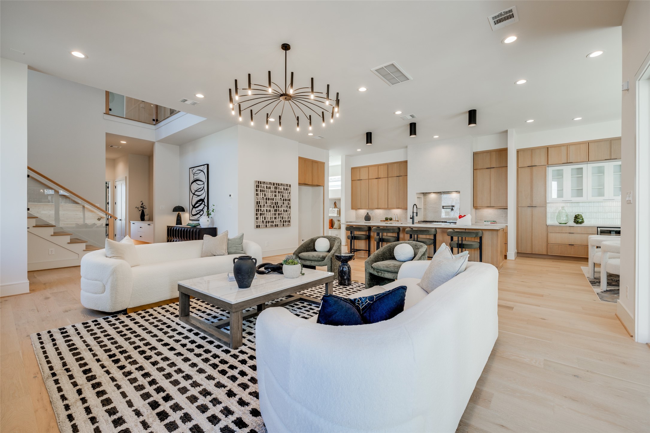 1701 Banks Street Houston, TX 77098 - Photo 12 of 44 a living room with lots of furniture and kitchen view