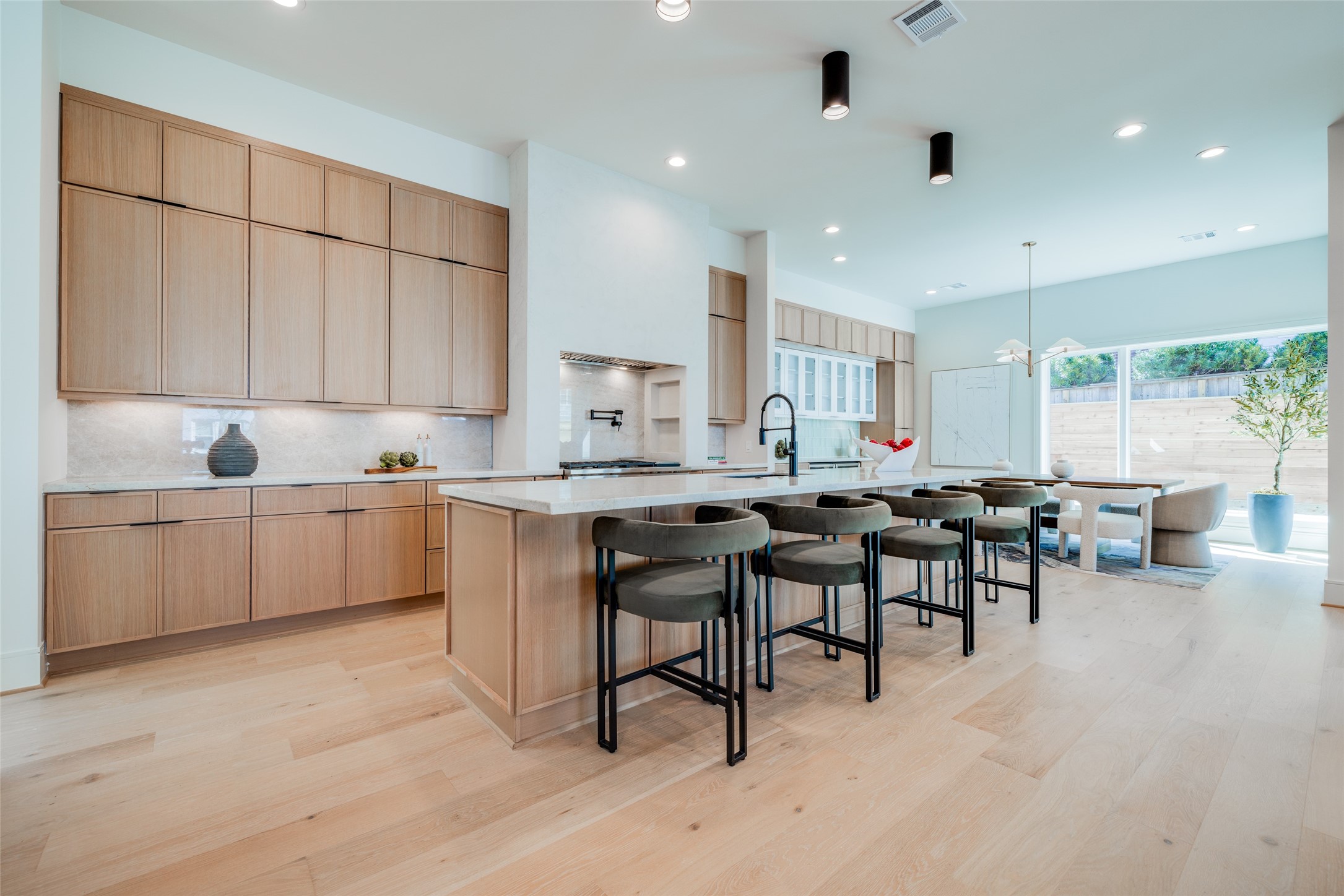 1701 Banks Street Houston, TX 77098 - Photo 13 of 44 a kitchen with counter space cabinets appliances and a center island