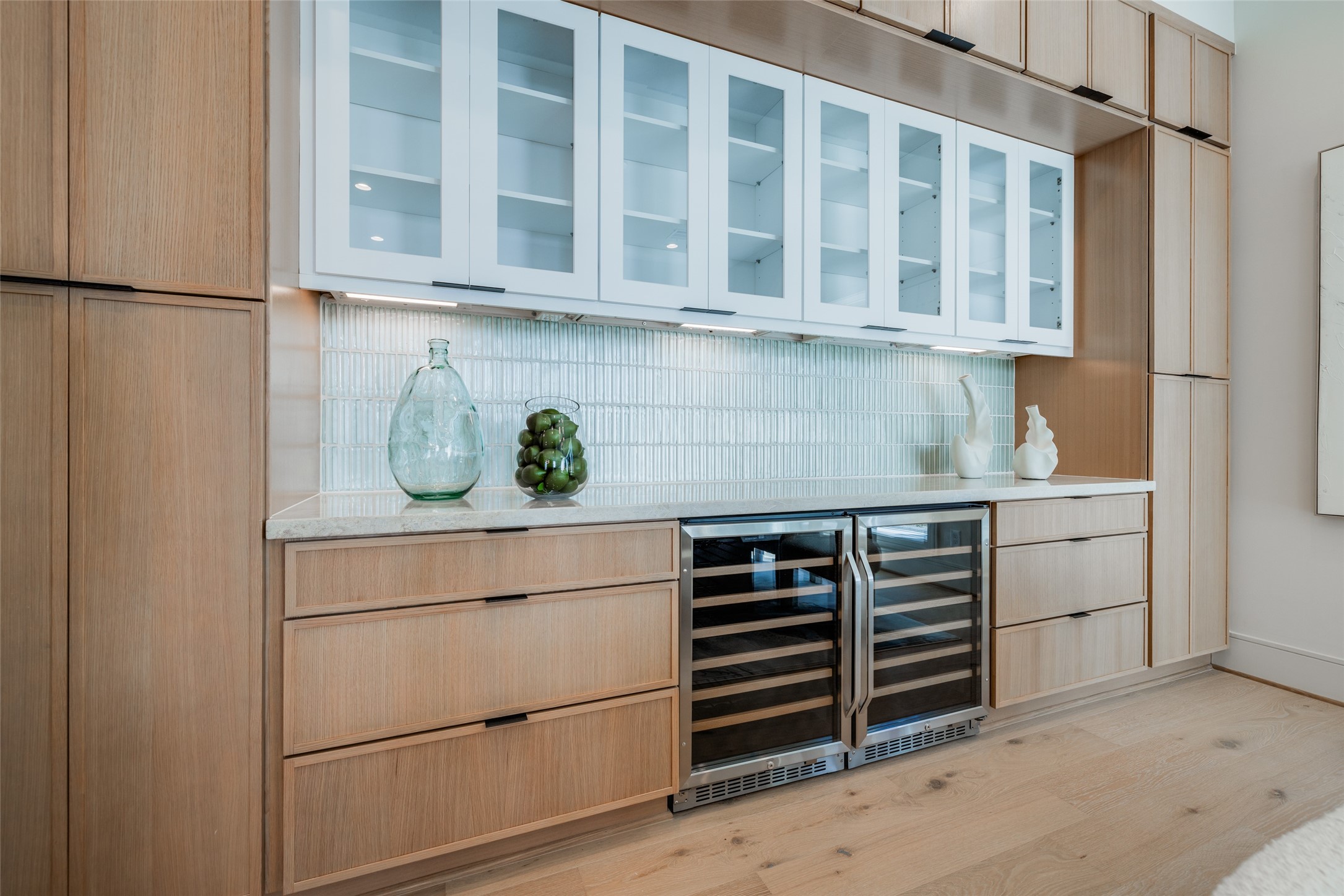 1701 Banks Street Houston, TX 77098 - Photo 15 of 44 a kitchen with white cabinets and a stove