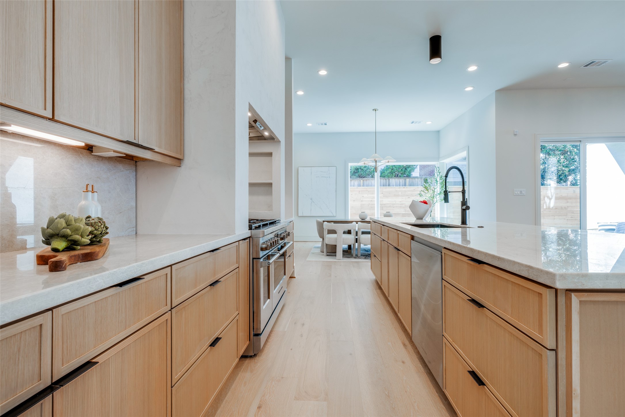 1701 Banks Street Houston, TX 77098 - Photo 19 of 44 a large kitchen with stainless steel appliances lots of counter space and a sink
