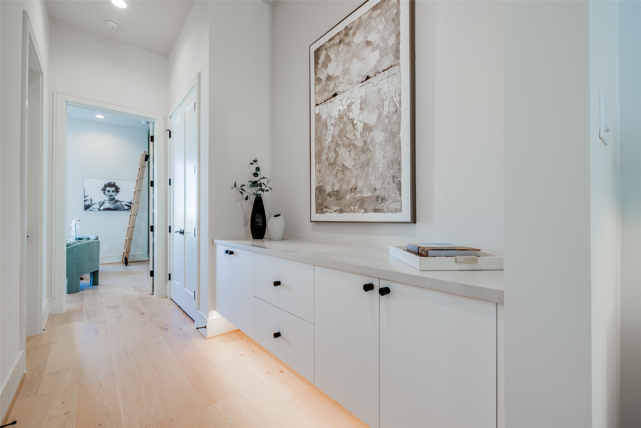 1701 Banks Street Houston, TX 77098 - Photo 24 of 44 a view of a hallway with closet and wooden floor