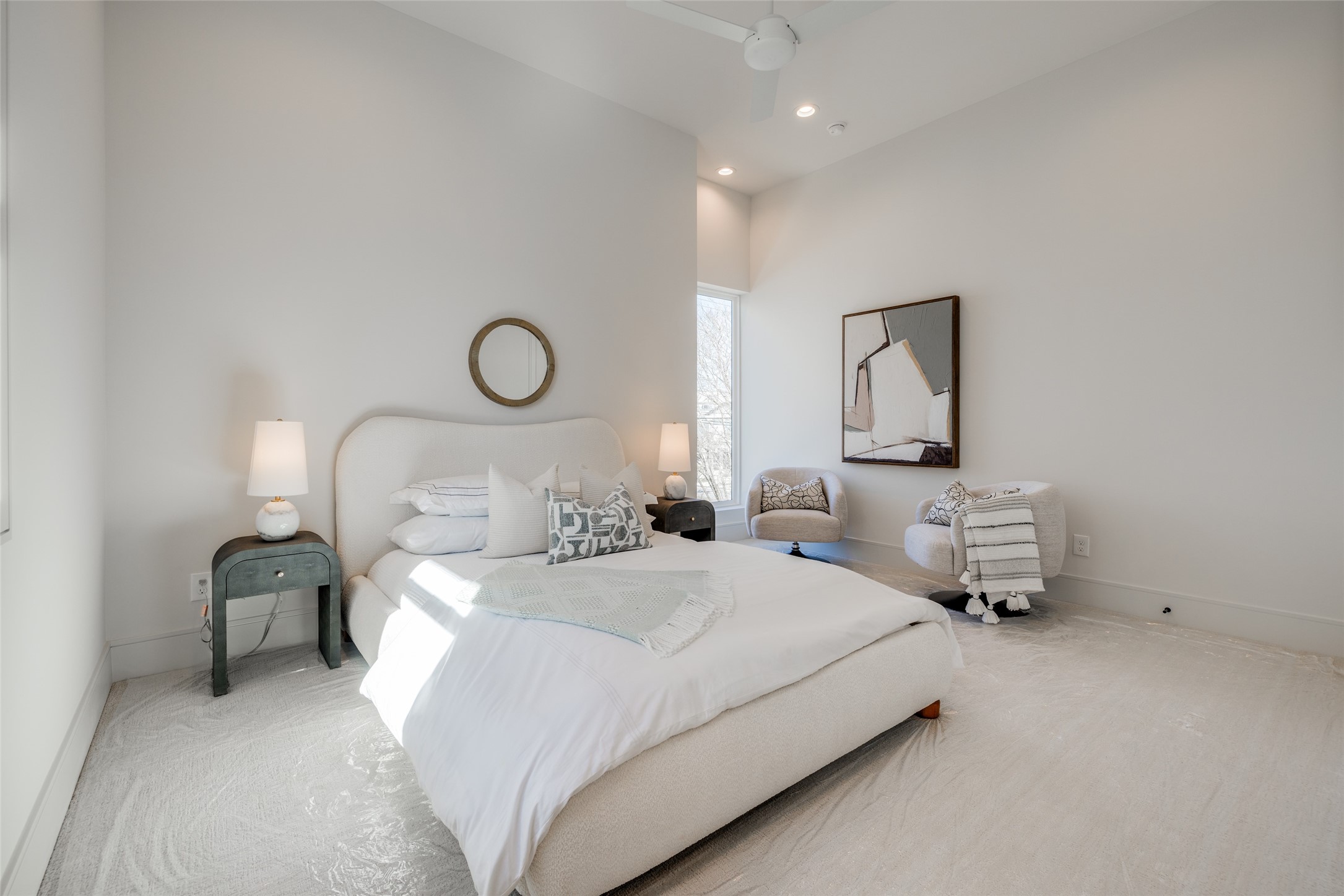 1701 Banks Street Houston, TX 77098 - Photo 29 of 44 a bedroom with a bed and lamp