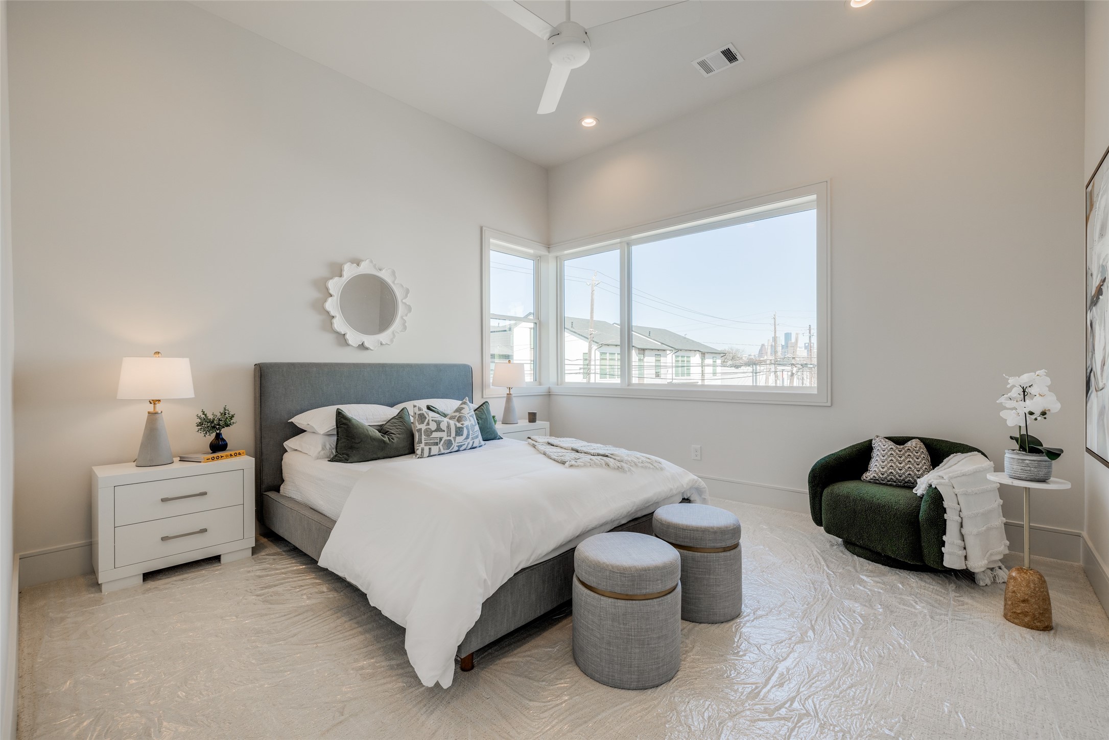 1701 Banks Street Houston, TX 77098 - Photo 35 of 44 a bedroom with bed and a large window