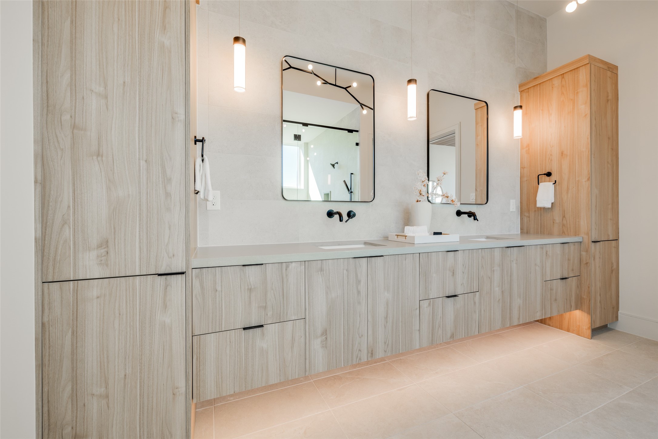 1701 Banks Street Houston, TX 77098 - Photo 38 of 44 a bathroom with a double vanity sink mirror and shower