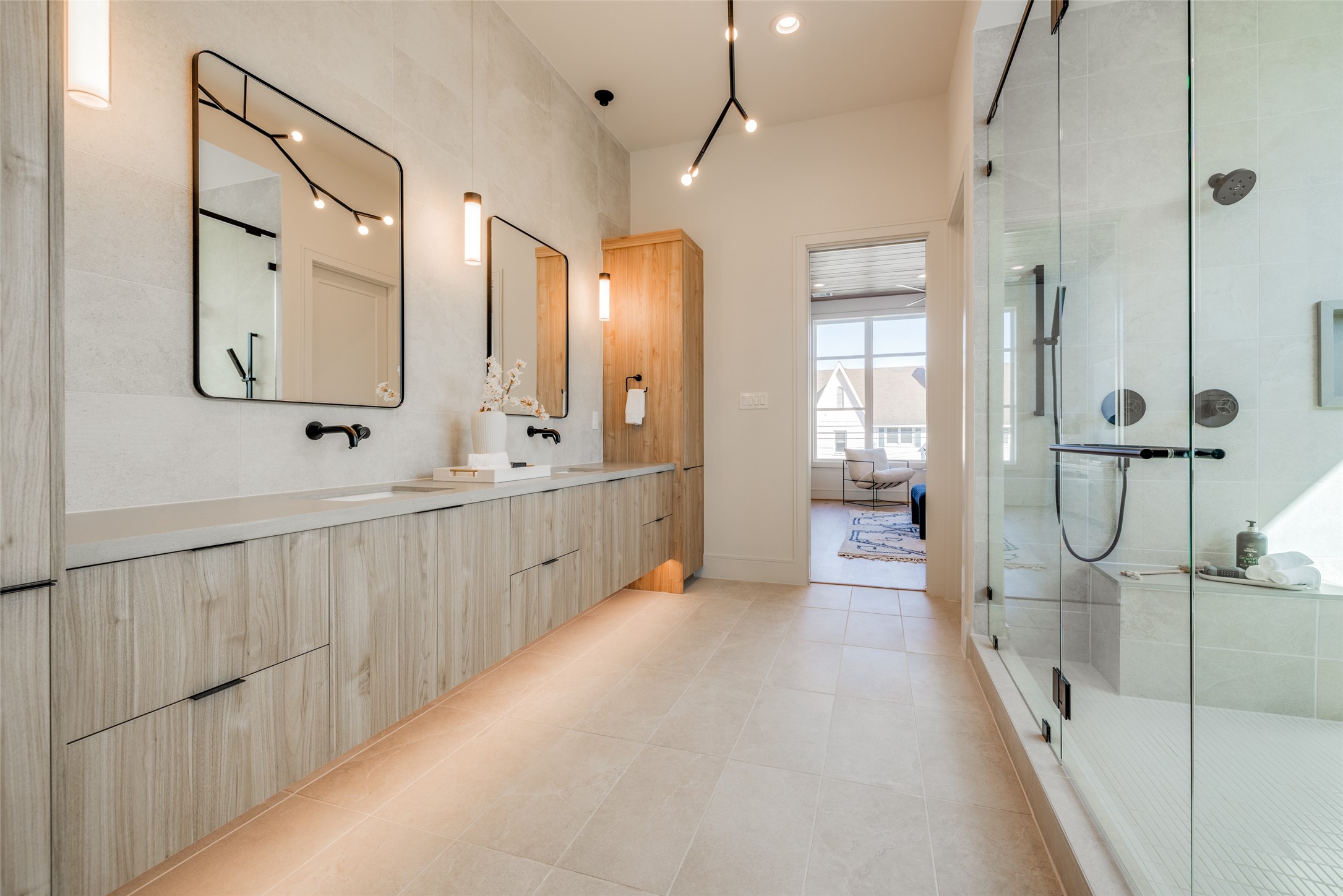 1701 Banks Street Houston, TX 77098 - Photo 39 of 44 a bathroom with a double vanity sink mirror and shower