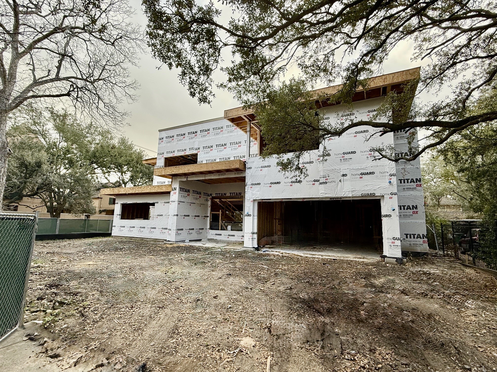 1701 Banks Street Houston, TX 77098 - Photo 9 of 44 a view of a house with a yard and garage