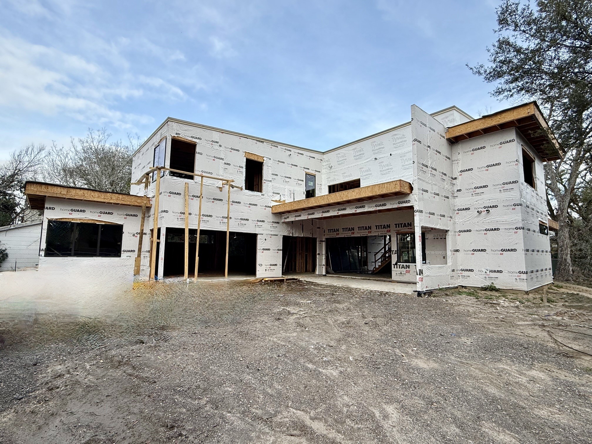 1701 Banks Street Houston, TX 77098 - Photo 10 of 44 a view of a house with a flat tv screen and a yard