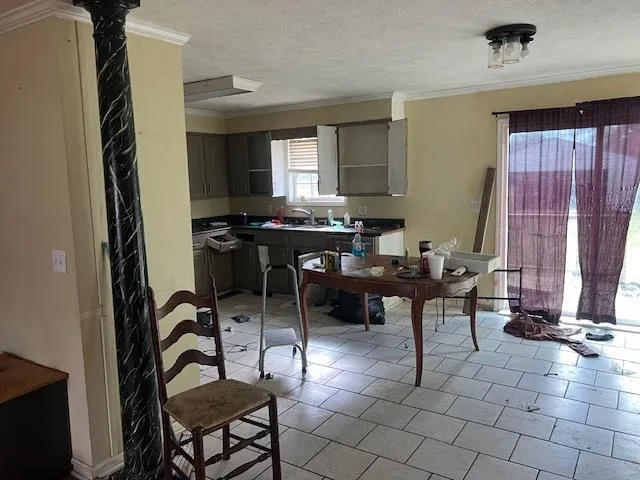 a view of a livingroom with furniture and window