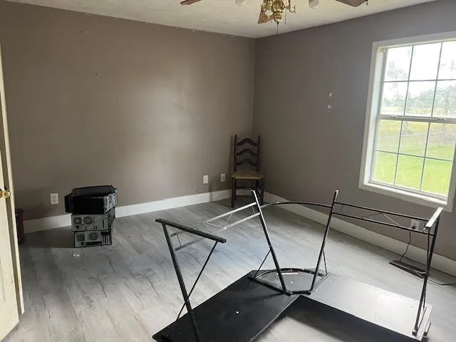 a workspace with furniture and a window