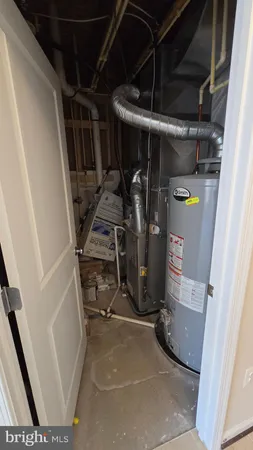 a sign that is sitting in front of flowers