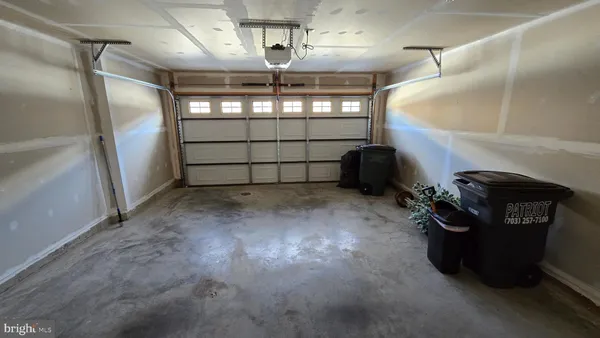 a front view of house with yard and swimming pool