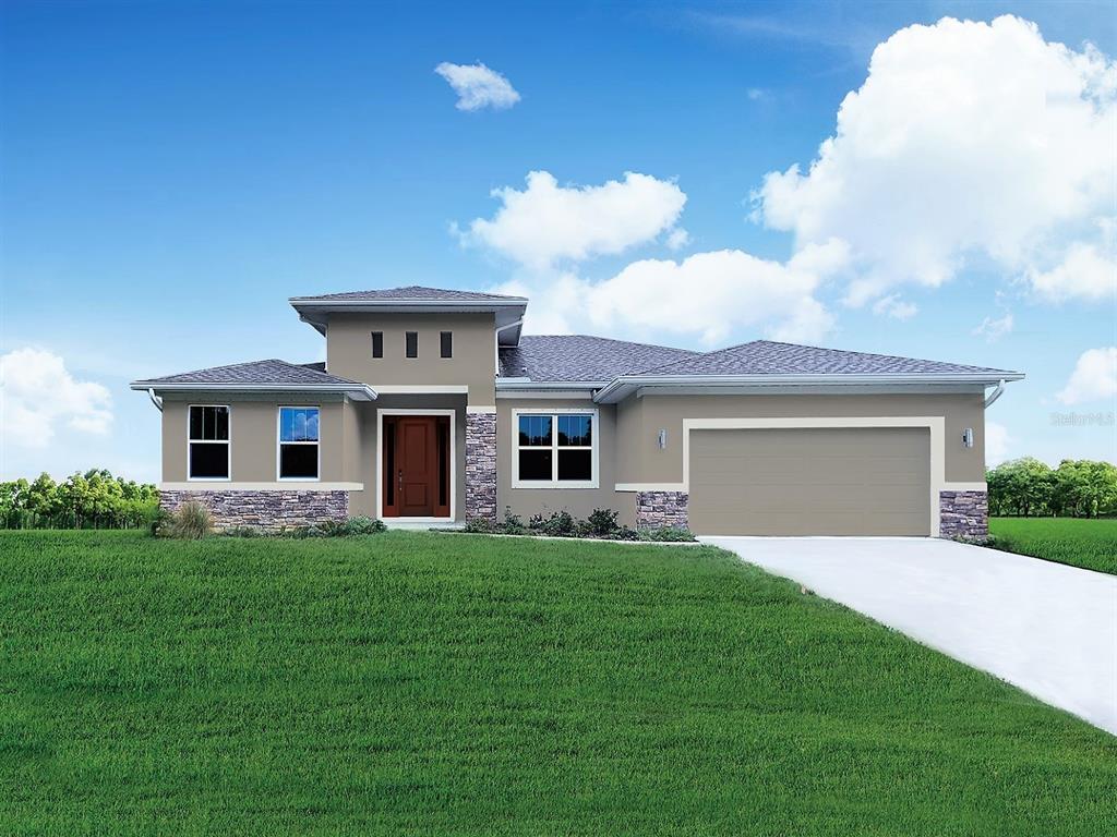 1554 Rainsville Road Southeast Palm Bay, FL 32909 - Photo 1 of 1 a front view of house with yard and green space