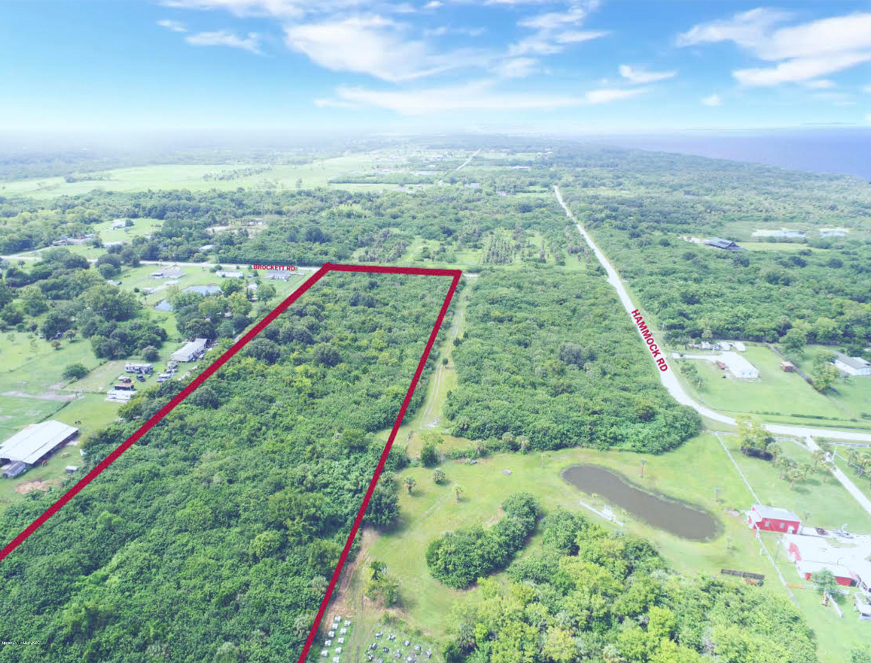 0 Brockett Road Mims, FL 32754 - Photo 2 of 4 a view of a lush green field