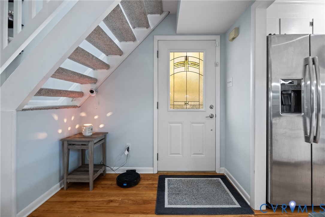 9901 Redbridge Road Chesterfield, VA 23236 - Photo 11 of 42 a dining room with furniture and chandelier