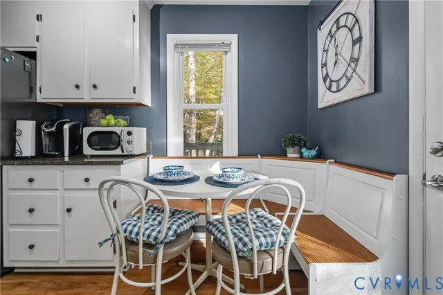 a view of a dining room with furniture