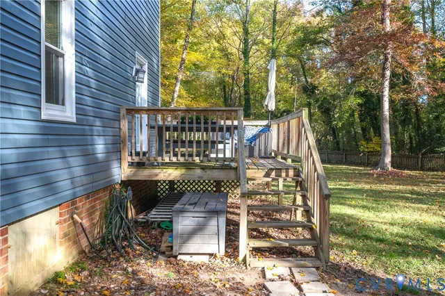 a view of a chair and table in the patio