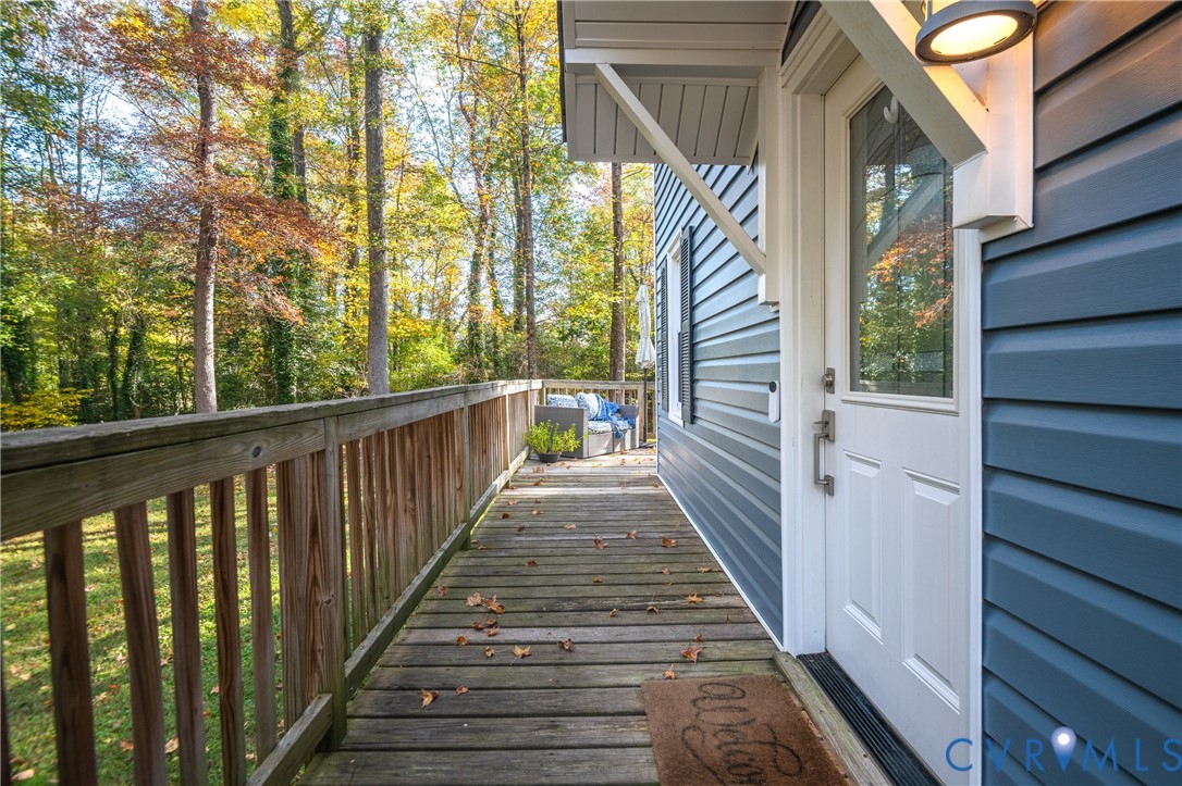 9901 Redbridge Road Chesterfield, VA 23236 - Photo 36 of 42 a view of a balcony with wooden floor