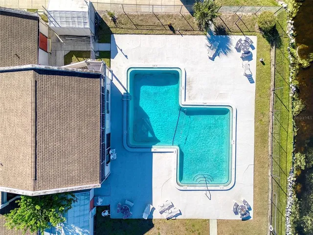 an aerial view of a house with garden