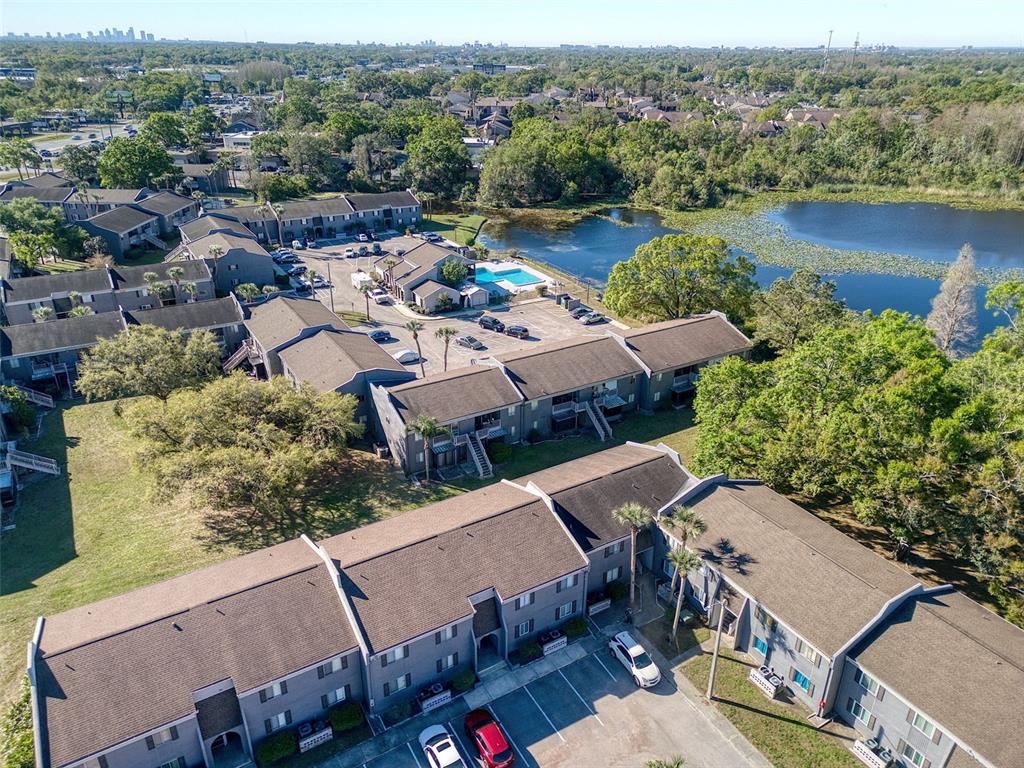 4004 Cortez Drive, Unit D Tampa, FL 33614 - Photo 24 of 30 an aerial view of a house with a lake view