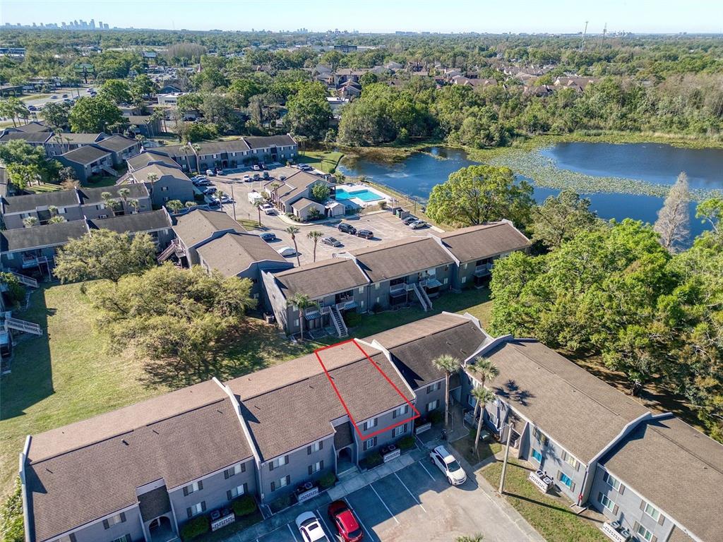 4004 Cortez Drive, Unit D Tampa, FL 33614 - Photo 25 of 30 an aerial view of a house with a lake view
