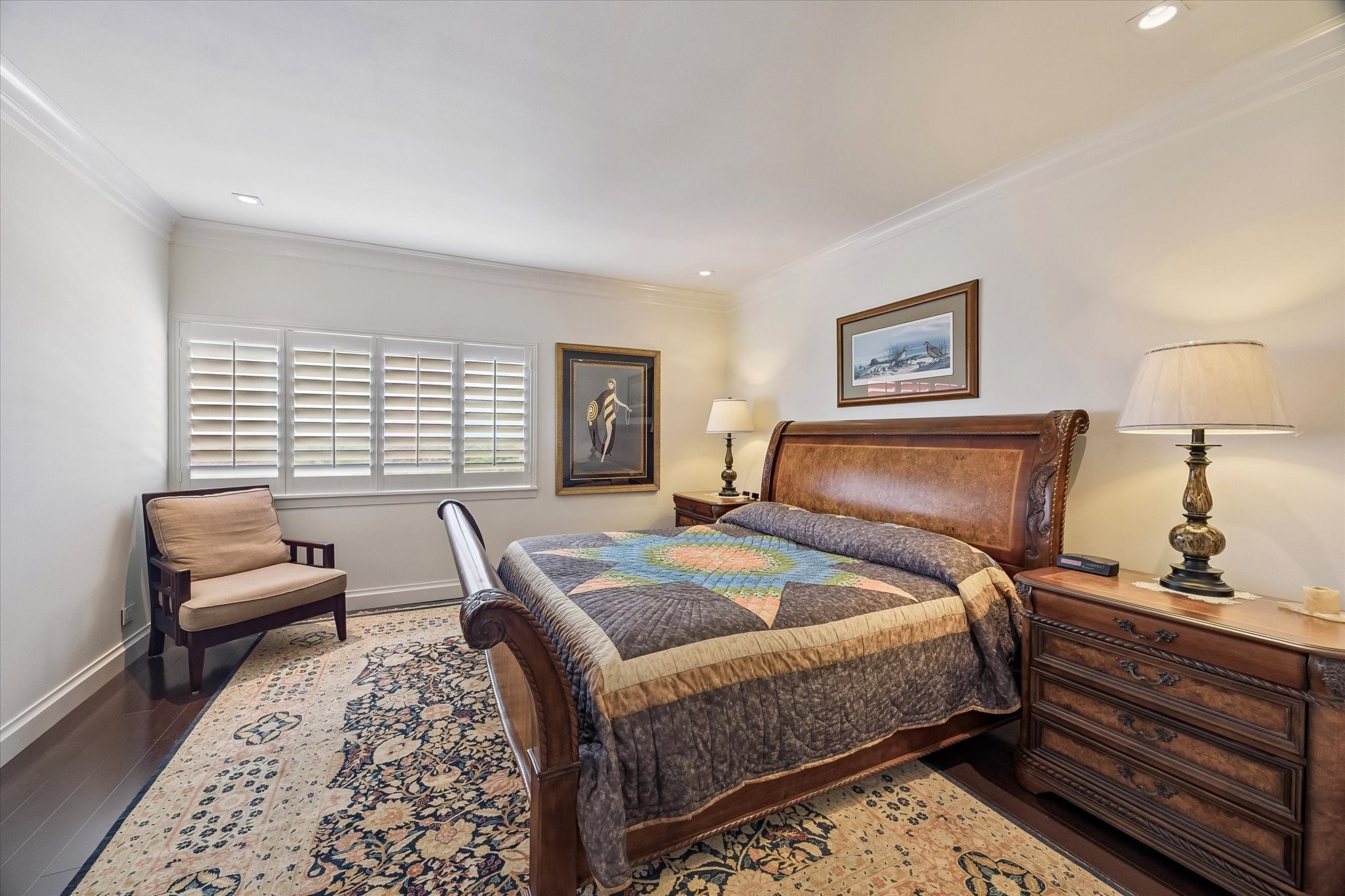 2929 Buffalo Speedway, Unit A1802 Houston, TX 77098 - Photo 18 of 50 a bedroom with a bed and wooden floor