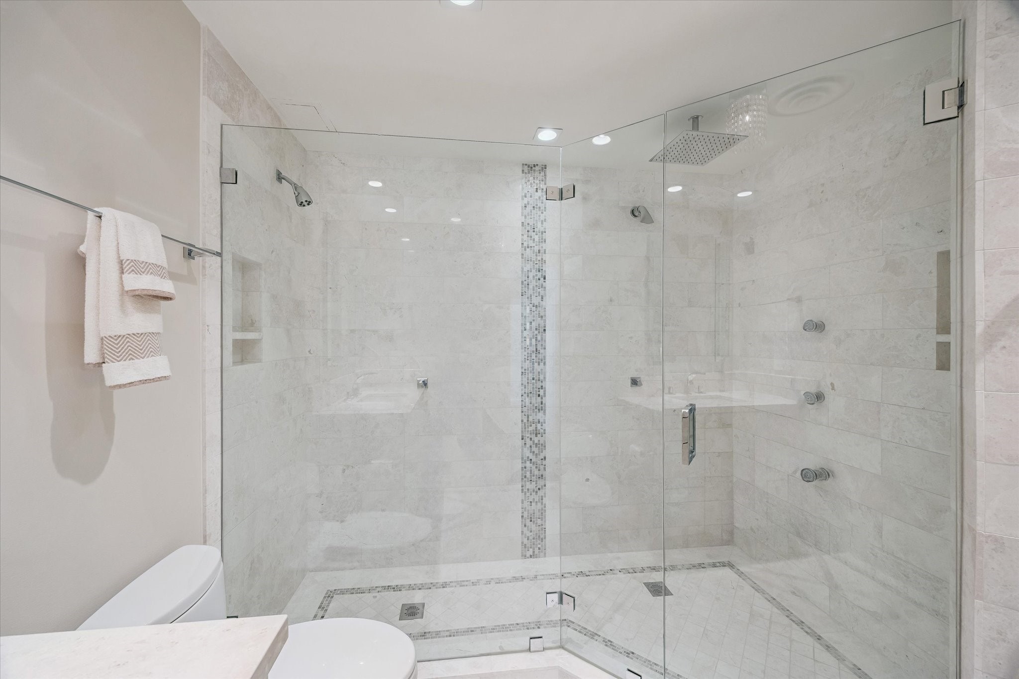 2929 Buffalo Speedway, Unit A1802 Houston, TX 77098 - Photo 21 of 50 a bathroom with a shower and toilet