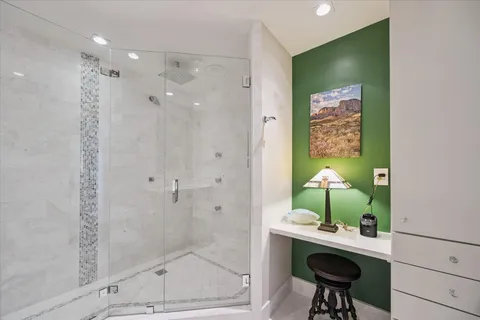 a bathroom with a sink and mirror