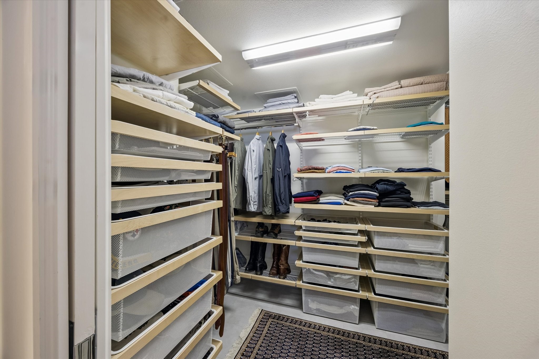 2929 Buffalo Speedway, Unit A1802 Houston, TX 77098 - Photo 24 of 50 a view of walk in closet with empty racks