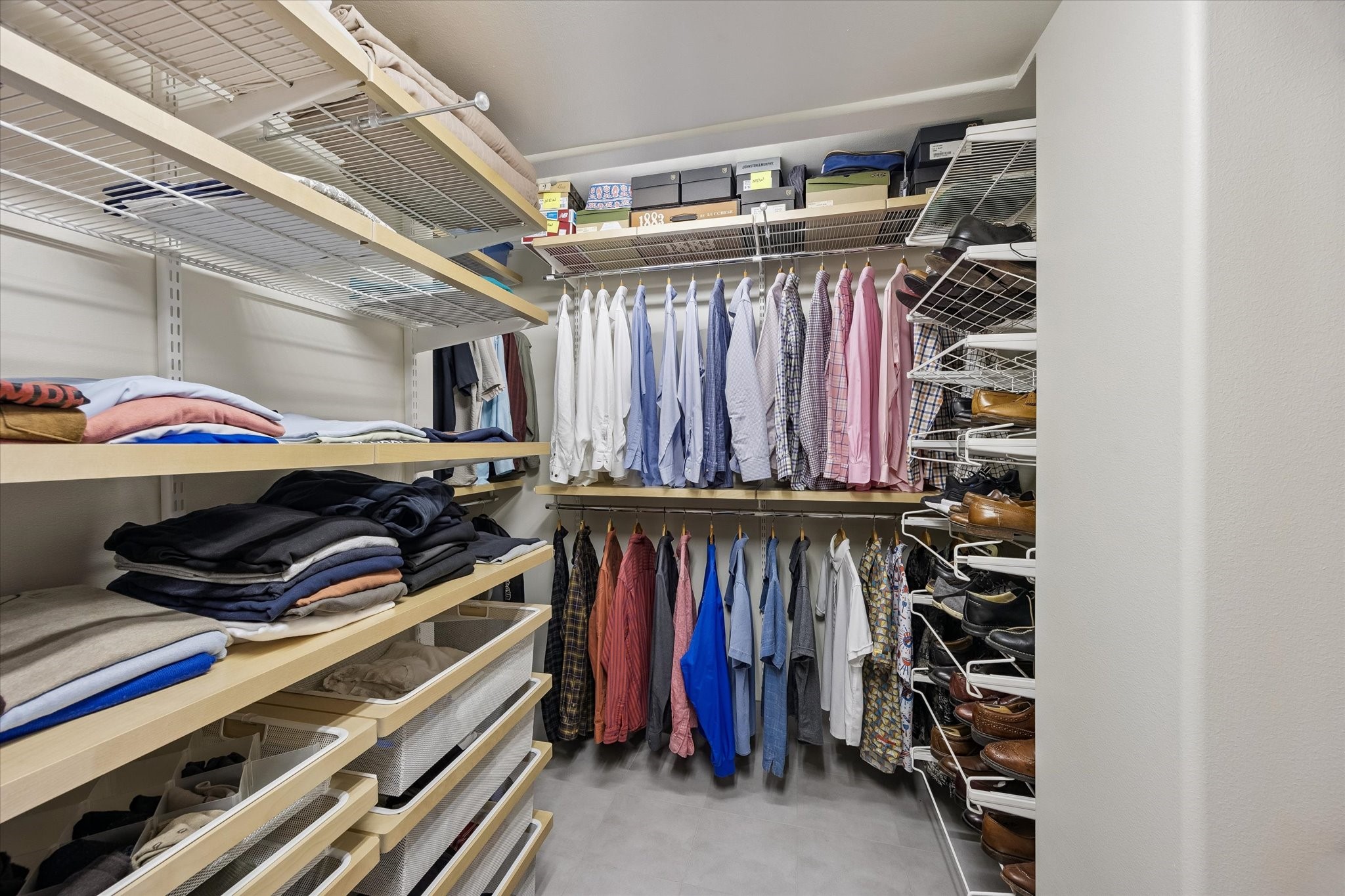 2929 Buffalo Speedway, Unit A1802 Houston, TX 77098 - Photo 25 of 50 a view of walk in closet with clothes and shoes